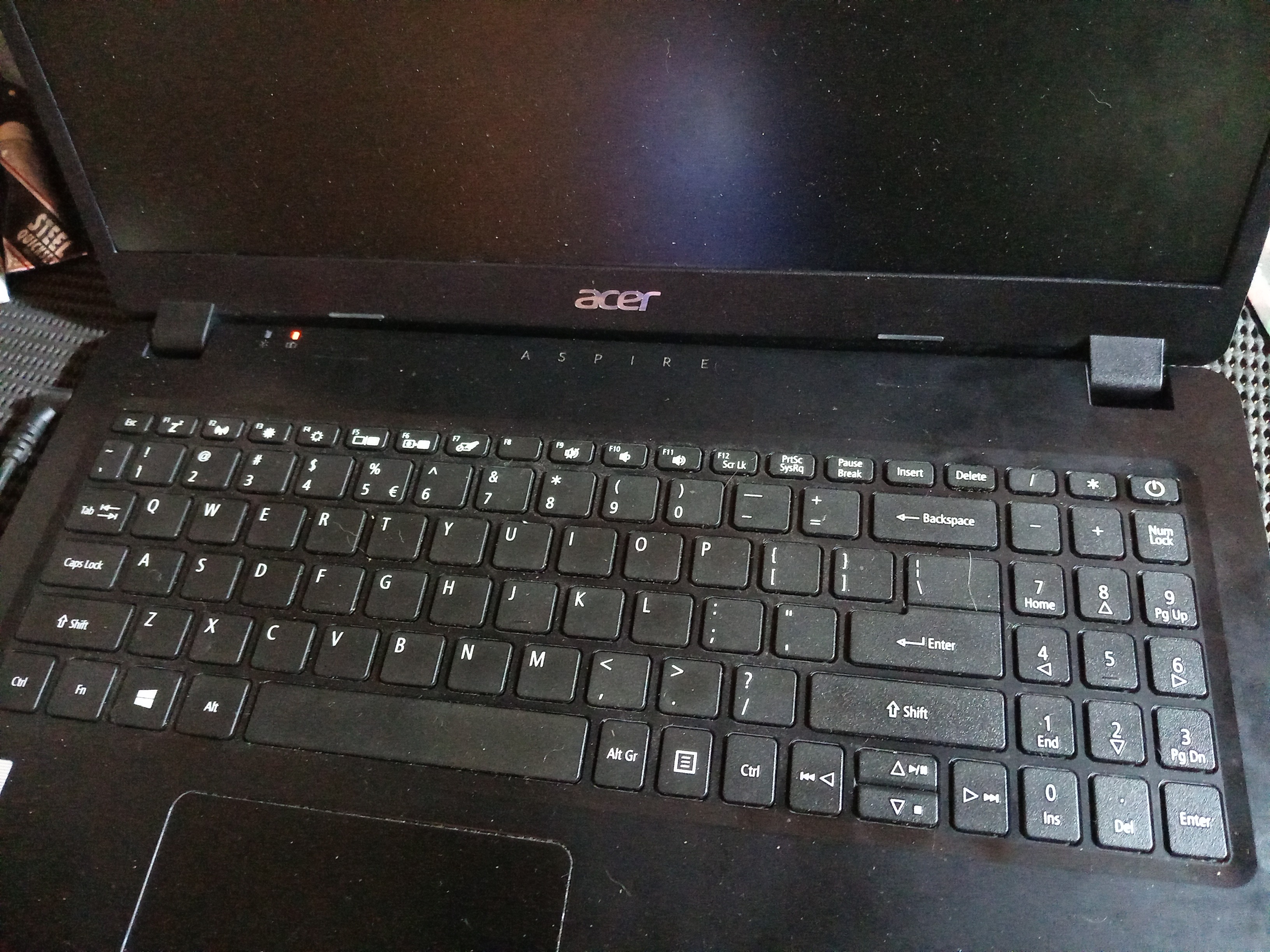 After hinge epoxy repair, on an Acer Aspire Laptop, bezel installed.